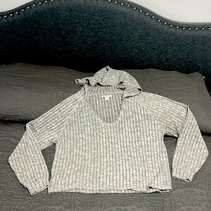 Billabong long sleeved, hooded shirt. Size medium